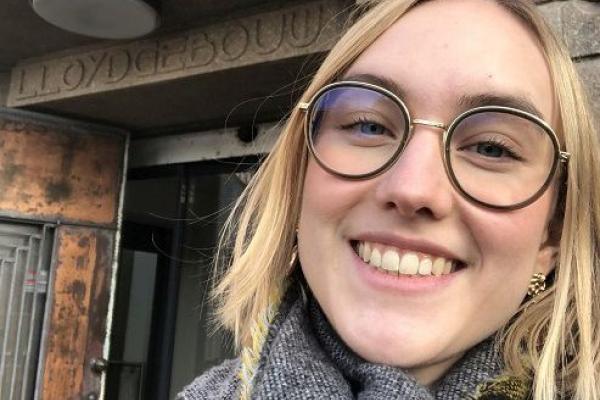smiling girl with glasses
